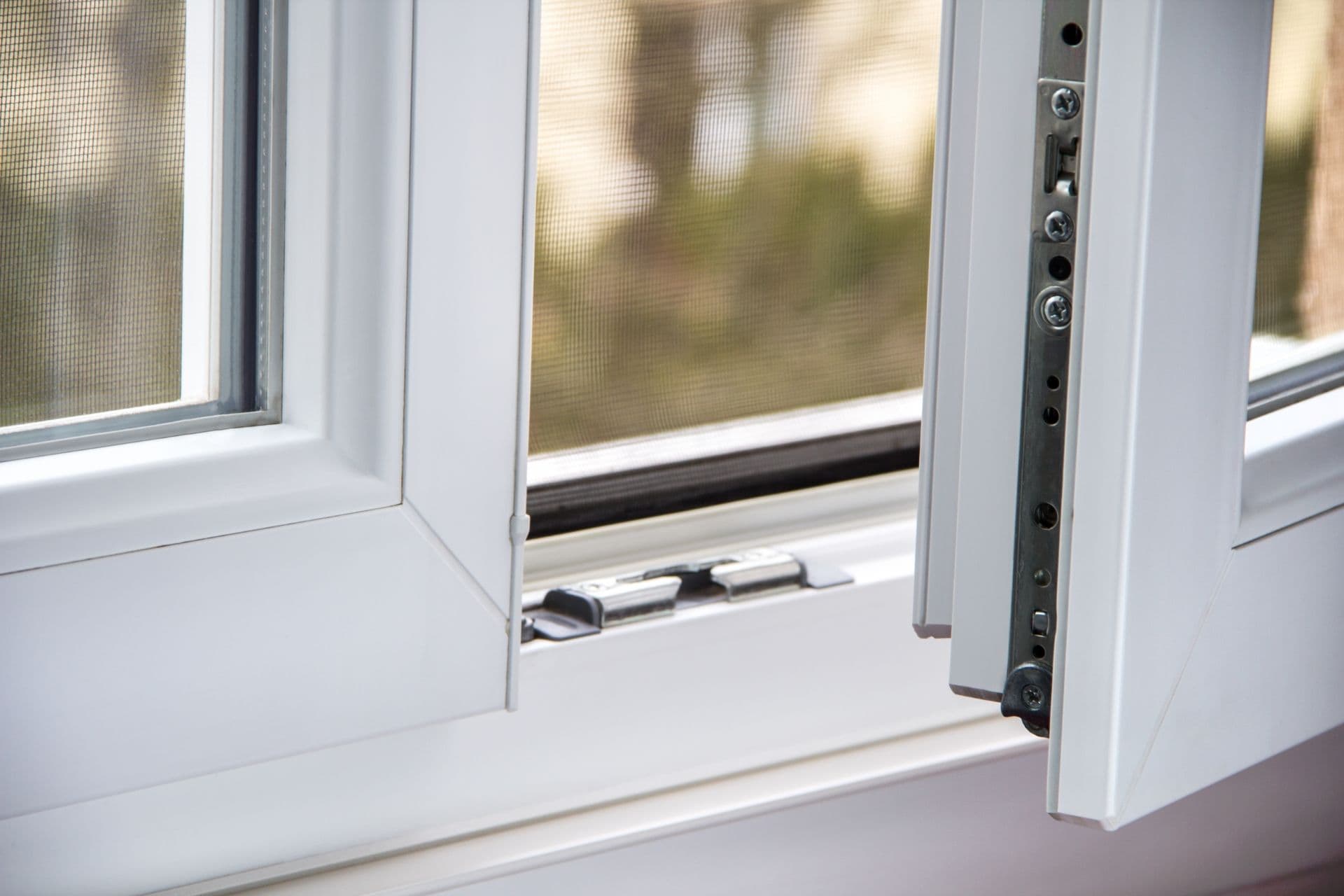 A close-up of the locking mechanism on a casement window.