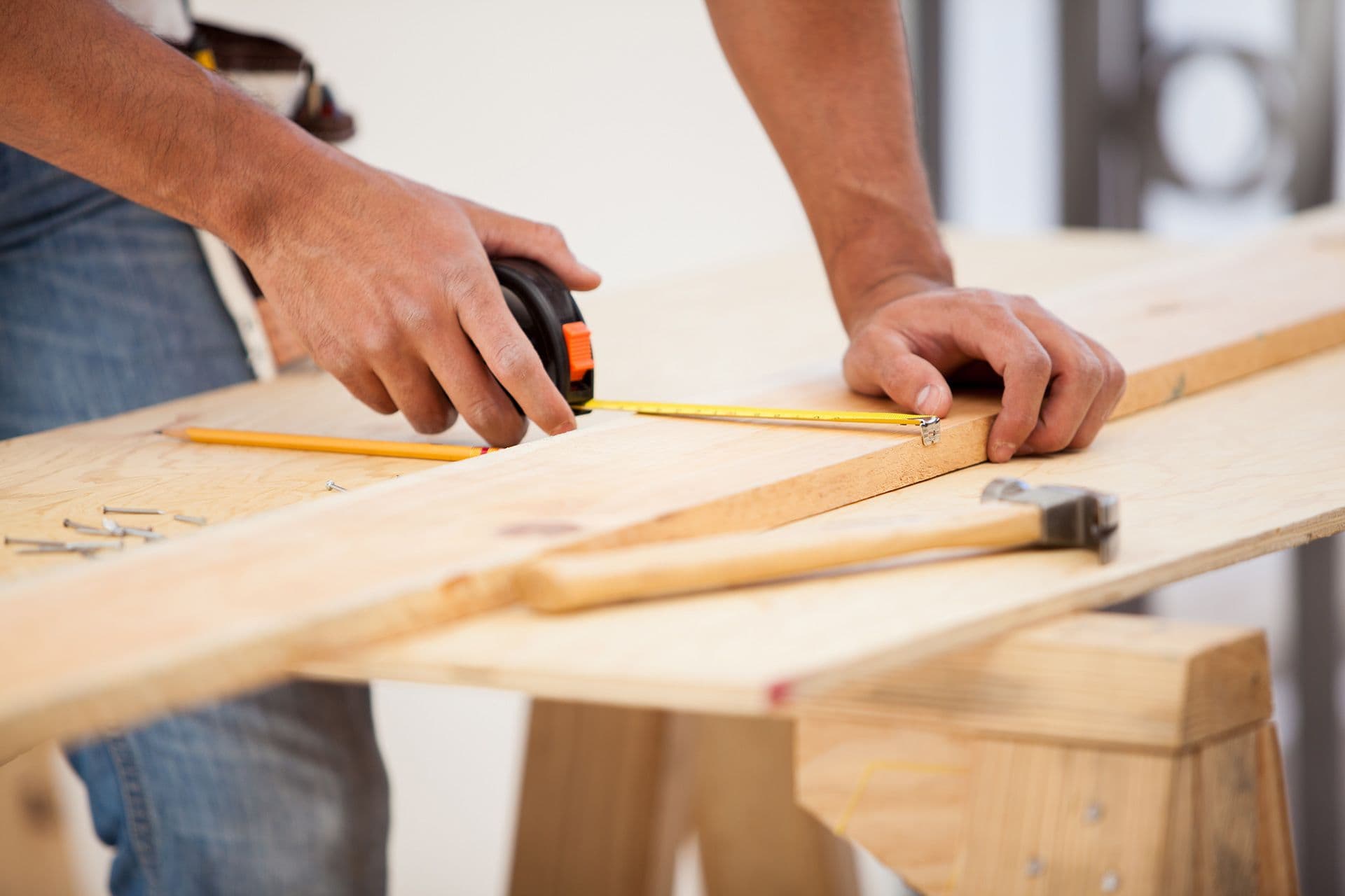 Person using measuring tape